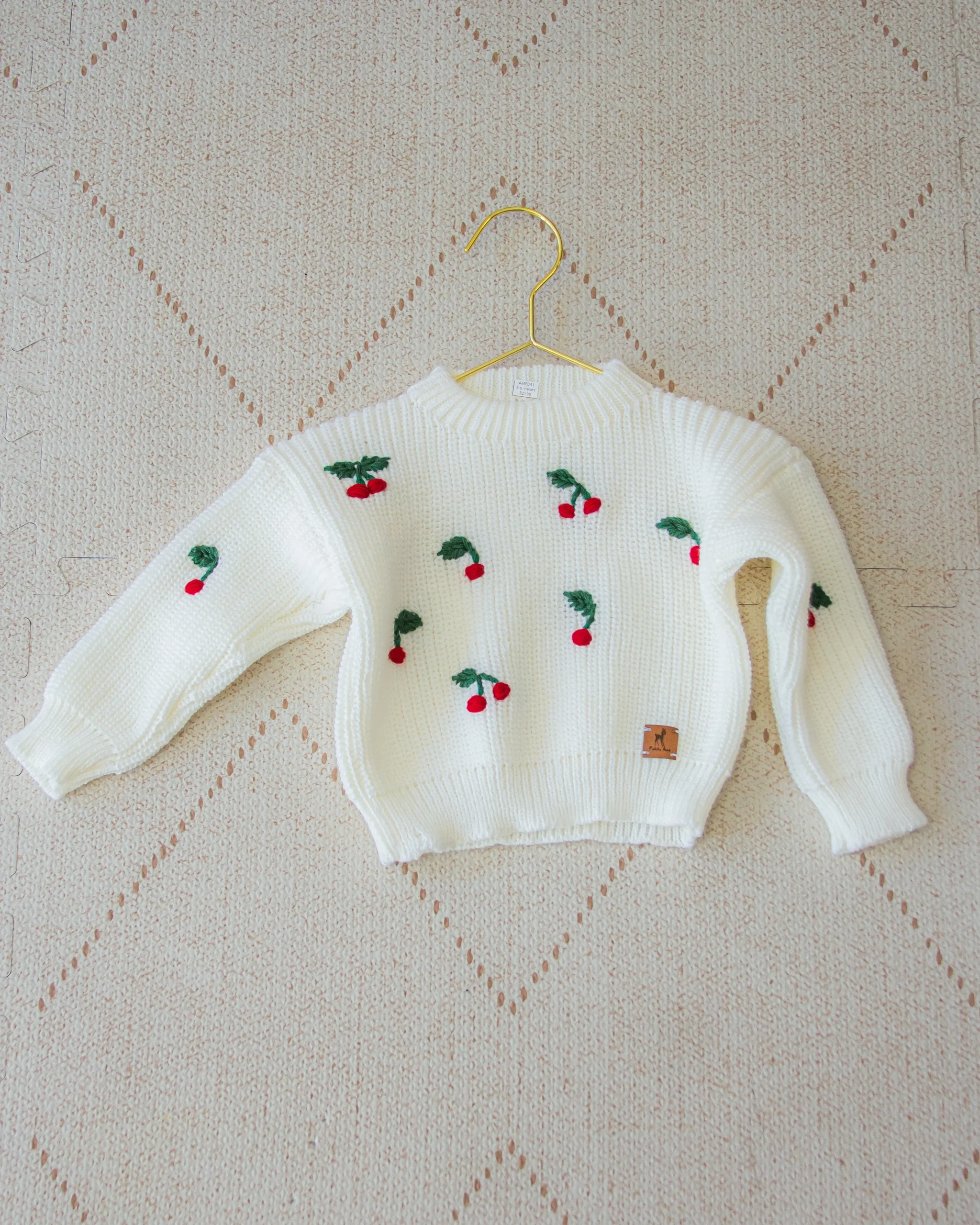 Buzo tejido cerezas